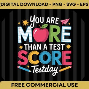 May include: A colorful digital graphic with the text "You Are More Than A Test Score Testday". The design includes a red apple, ruler, and pencil illustrations. The background is black with vertical stripes.