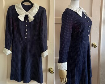 Vintage 1960’s navy blue and white polka dot day dress with collar and bow tie waist 30"