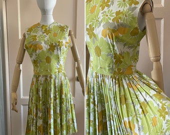 Vintage 1960’s muted Green, yellow and white floral summer dress with full pleated skirt  waist 28"