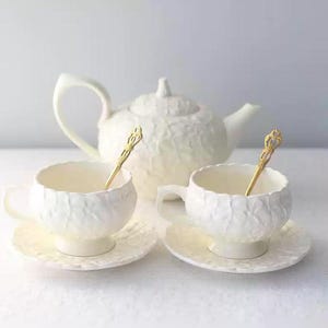 Vintage Porcelain Tea Set: Embossed Ceramic Coffee Cups & Saucers