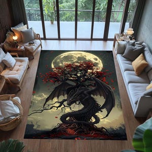 May include: A rectangular area rug featuring a fantasy scene. A black dragon with large wings is beneath a tree with red leaves, set against a backdrop of a full moon and cloudy sky. The rug is designed for indoor use.