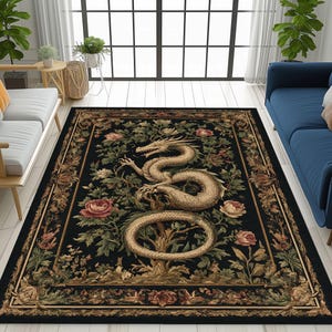 May include: A rectangular black area rug featuring a golden dragon design surrounded by roses and foliage. The rug has a detailed border with floral patterns. The dragon is the central focus, with its body forming a circular shape.