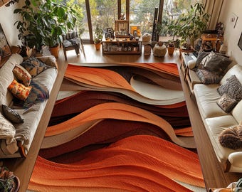 May include: A large area rug with a wave-like pattern in shades of orange, brown, and cream. The rug is the focal point of a living room with white sofas, plants, and large windows overlooking a natural outdoor scene.