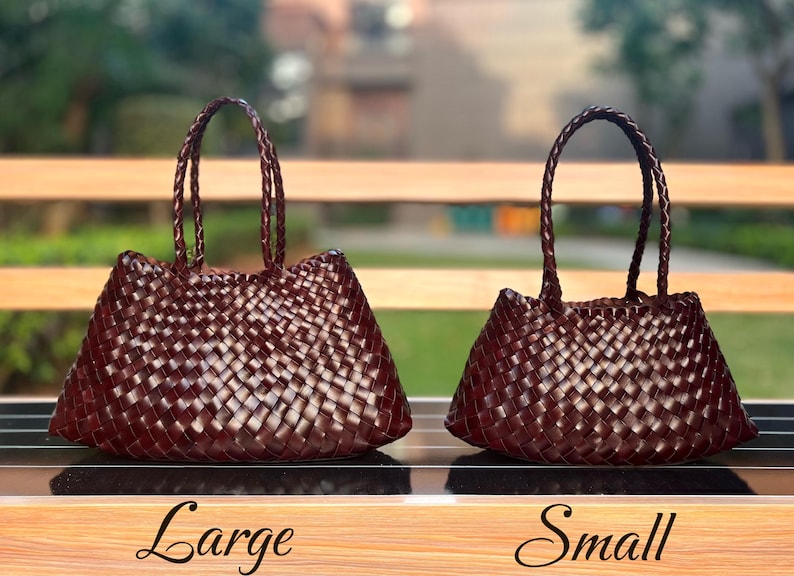 May include: Two woven brown tote bags, one large and one small, with braided handles. The bags are displayed on a wooden surface with the words "Large" and "Small" written below them.