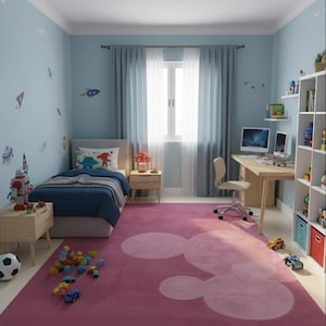 May include: A child's bedroom with light blue walls and rocket ship decals. The room includes a bed with blue bedding, a desk with a computer, and a pink rug with a Mickey Mouse design. Toys are scattered on the floor.