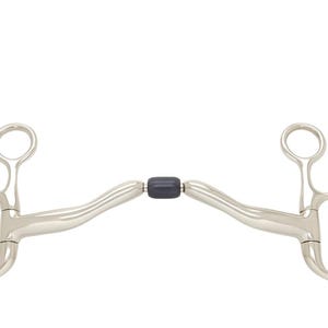 May include: A silver-coloured metal horse bit featuring a smooth, curved mouthpiece with a central dark blue cylindrical roller. The bit includes two large D-shaped rings on each side, connected to smaller upper rings for attachment to a bridle.
