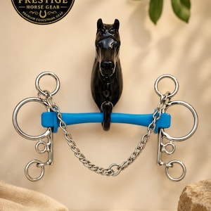 Bocado de caballo flexible de goma azul, bocado de acero inoxidable con carrilleras.