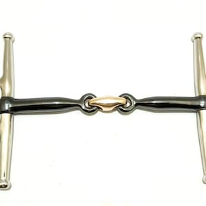 May include: A stainless steel horse bit with a black and gold center. The bit has a straight bar design with a ring on each side and a T-shaped bar. The center section is black with a gold-colored link.