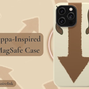 May include: A MagSafe phone case with an Appa-inspired design. The case is off-white with a brown arrow and horns design. The text "Appa-Inspired MagSafe Case" is displayed on a brown rectangle. The brand name "GrimoireInk" is also visible.