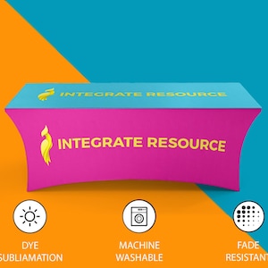 May include: A rectangular fitted table cover with a bright pink front and a turquoise top. The text INTEGRATE RESOURCE and a yellow bird logo appear on both surfaces. Three circular icons below indicate dye sublimation, machine washable, and fade resistant.