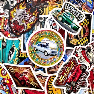 May include: A selection of car-themed stickers featuring classic designs. Stickers include a 1965 Plymouth Satellite, a green car with a woman, and a red hot rod. Other stickers feature flames and text like "Hot Rod Club".