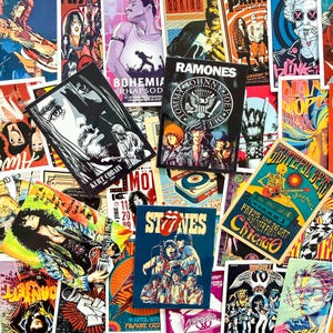 Peut inclure: Un ensemble d'affiches de groupes de rock color&eacute;es, avec des musiciens embl&eacute;matiques et des dates de concerts. Les affiches incluent Kurt Cobain, The Rolling Stones et The Ramones. Les designs sont un m&eacute;lange de vintage et de moderne.