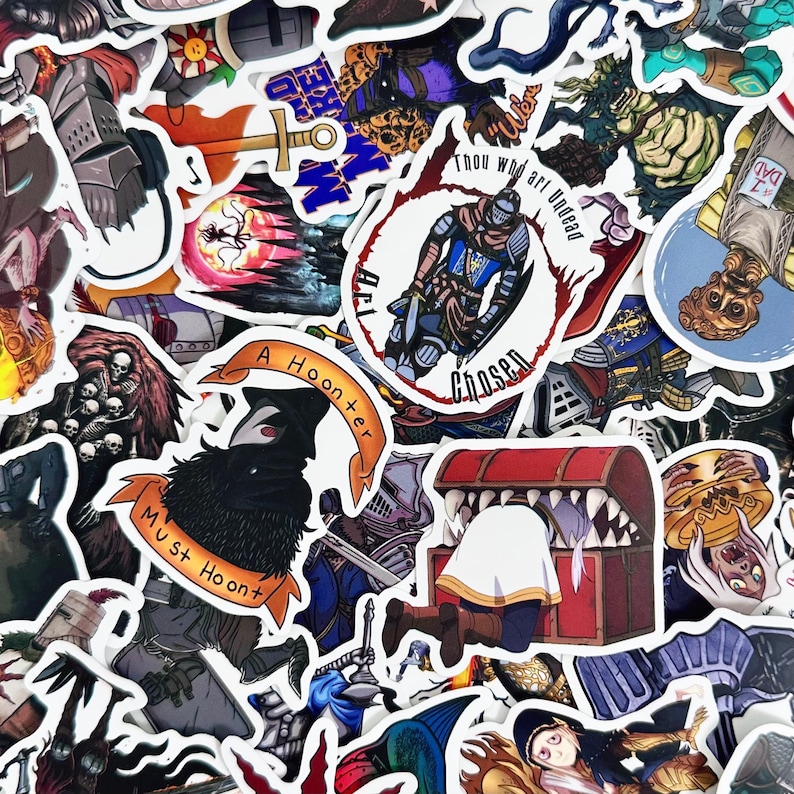 May include: A selection of fantasy-themed stickers with vibrant illustrations. The designs include knights, creatures, and phrases such as "Thou art Undead" and "A Hoonter Must Hoon". The stickers are glossy and come in various shapes and sizes.