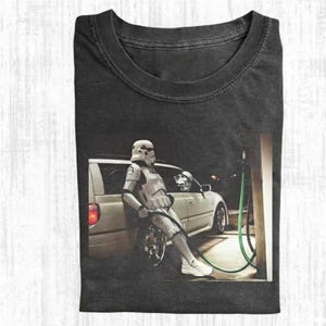 May include: A set of three ceramic mugs with a speckled, matte finish. The mugs are in shades of cream, light gray, and dark gray. Each mug has a simple, minimalist design, perfect for coffee or tea.