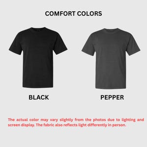 May include: Two short-sleeved t-shirts, one black and one pepper-colored, are displayed against a light background. The text "COMFORT COLORS" is at the top, with "BLACK" and "PEPPER" below the shirts. Additional text explains color variations.