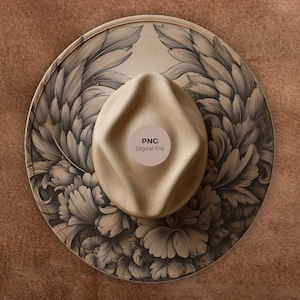 May include: A tan fedora hat with a wide brim, featuring a detailed floral and leaf pattern in shades of brown and beige. The hat has a rounded crown and a circular sticker that reads "PNG Digital File".