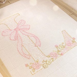 Embroidery Design Alphabet with bow and delicate floral