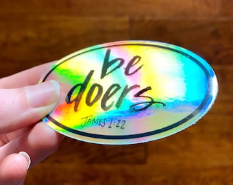Be Doers holographic sticker featuring my watercolor lettering from James 1:22, But be doers of the word, and not hearers only, metallic