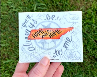 Home Sweet Home TN sticker with Tennessee elements like iris, mocking bird, tri-star,  4" wide vinyl decal that is water and weatherproof