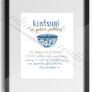 May include: A framed print with a blue and white bowl with gold cracks. The text reads "kintsugi" and "a golden journey". The text below the bowl reads "The Japanese art of repairing broken pottery with precious metals, making it a part of its unique history and becoming more beautiful than ever before."