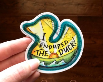 Duck River vinyl sticker, "I endured the Duck!" with canoe / kayak and sun