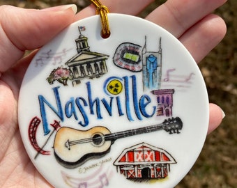 Nashville TN Ornament, ceramic ornament with string, featuring Capitol Building, Grand Ol Opry, guitar and music