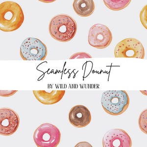May include: A seamless pattern of watercolour doughnuts in various colours including pink, blue, brown, and yellow, some with sprinkles. A white horizontal banner across the centre displays the black text Seamless Donut BY WILD AND WUNDER.