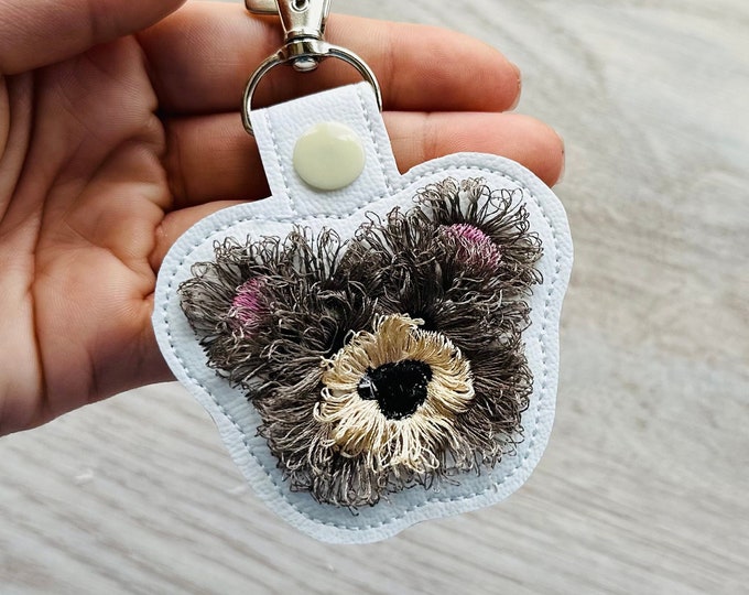 Fringed Bear Face Eyelet and Key Fob Snap Tab in the hoop machine embroidery designs ITH project keychain fluffy animal kids backpack tag