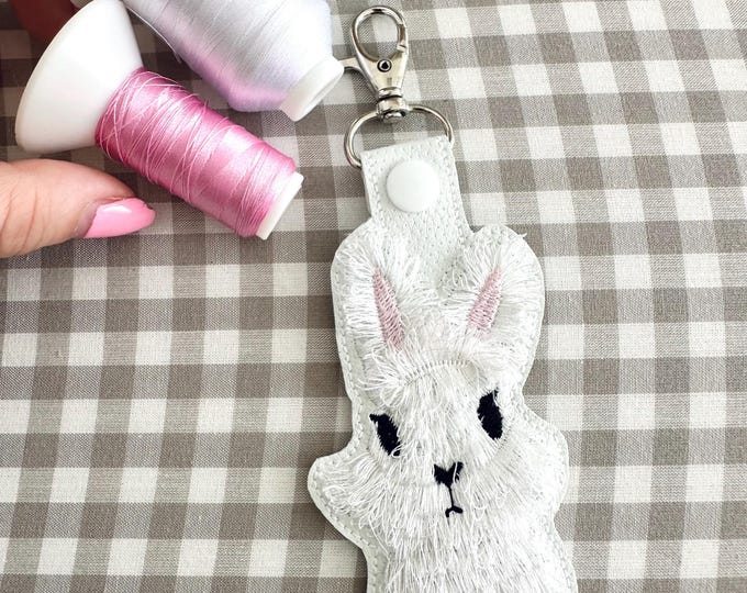 Cute Fluffy Bunny key fob snap tab and eyelet Easter Bunny keychain in the hoop machine embroidery designs ITH fringed fuzzy fur chenille