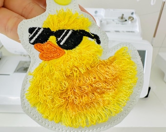 Fringed Rubber Duck Sun Glasses Eyelet and Key Fob Snap Tab in the hoop machine embroidery designs ITH project fluffy bath duck kids bag tag