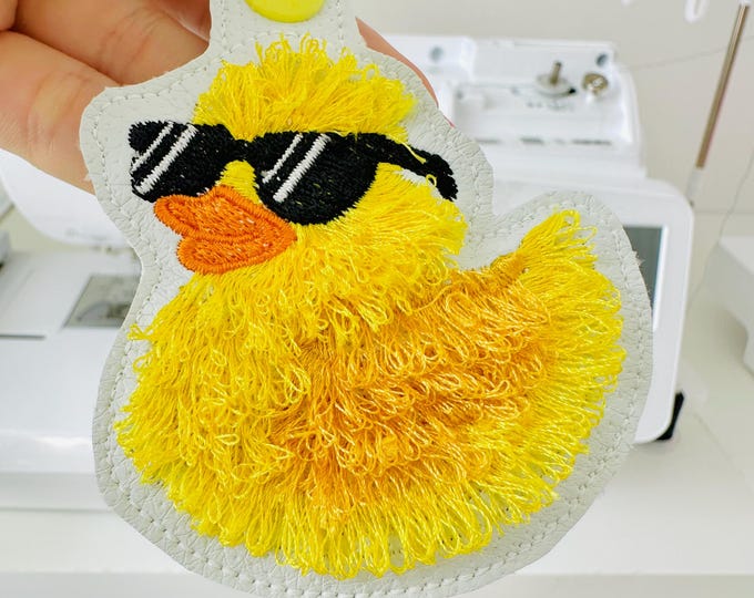 Fringed Rubber Duck Sun Glasses Eyelet and Key Fob Snap Tab in the hoop machine embroidery designs ITH project fluffy bath duck kids bag tag
