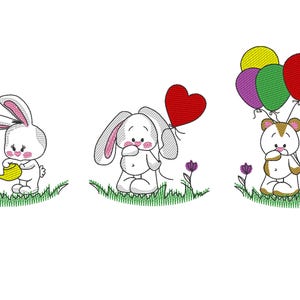 May include: An embroidered design featuring three cartoon characters: a bunny watering a flower, a bunny holding a heart-shaped balloon, and a bear holding balloons. The characters are on a grassy field with flowers.