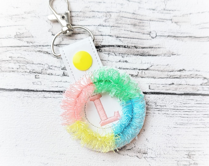 Fringed fluffy key fob snap tab with Monogram ITH in the hoop machine embroidery designs for hoop 4x4, kids keychain bag tag tutorial incl