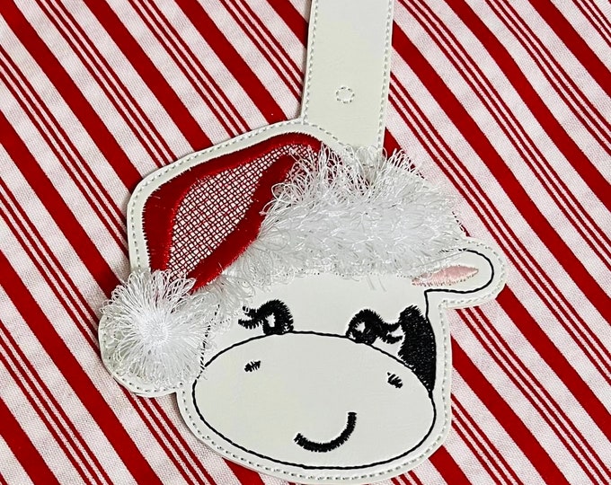 Cow heifer fringed Santa hat key fob snap tab machine embroidery designs Christmas keychain in the hoop simply ITH project farm gift idea