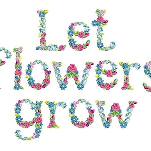 May include: Embroidered floral design with the text "Let flowers grow" in a colourful font. The letters are made up of pink, blue and yellow flowers.