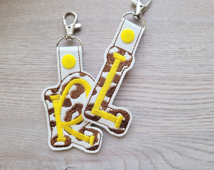 Key fob snap tab leopard spot Monogram alphabet initial letters from A up to Z in the hoop ITH keychain bag tag machine embroidery designs