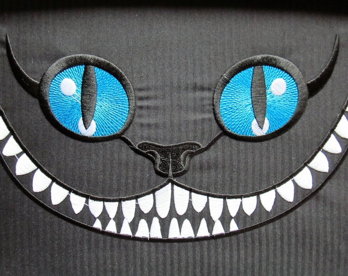 The Cheshire Cat machine embroidery designs in multiple sizes for hoop 4x4  5x7  6x10 Alice in Wonderland Cat face T-shirt pillow toy design