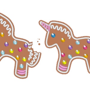 Pode incluir: Dois biscoitos de gengibre em forma de unicórnio, um com uma mordida. Os biscoitos são decorados com doces coloridos e glacê branco.