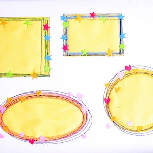 May include: Four embroidered frames with different shapes and colors. The frames are decorated with stars and hearts. The frames are on a white background.