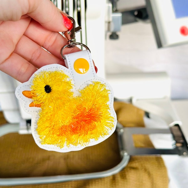 Fringe Rubber Duck Eyelet and Key Fob Snap Tab in the hoop machine embroidery designs ITH project key fluffy fur bath duck kids backpack tag