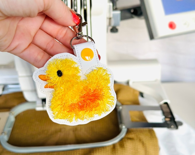 Fringed Rubber Duck Eyelet and Key Fob Snap Tab in the hoop machine embroidery designs ITH project fluffy fur bath duck kids backpack tag