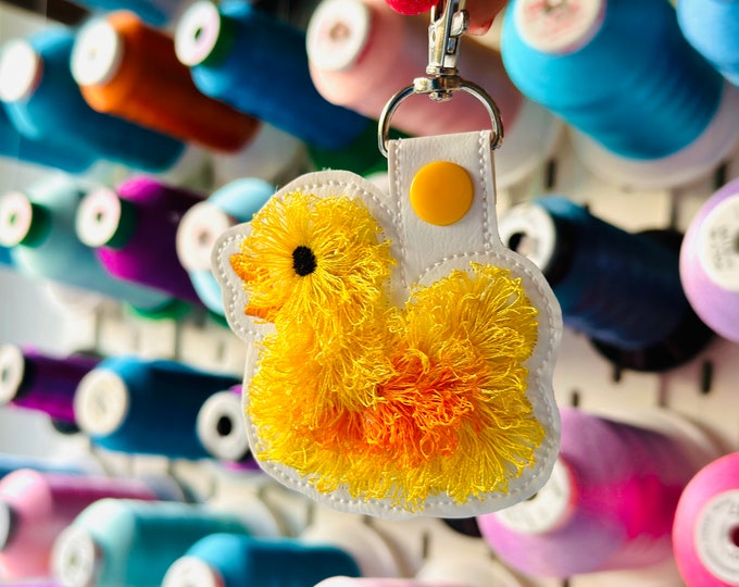 Fringed Rubber Duck Eyelet and Key Fob Snap Tab in the hoop machine embroidery designs ITH project fluffy fur bath duck kids backpack tag
