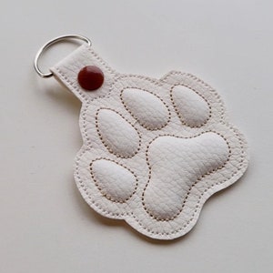 Motifs spéciaux de broderie machine Puffy Puff patte en mousse ITH dans le cerceau 4 x 4 animal de compagnie porte-clés porte-clés onglet pression