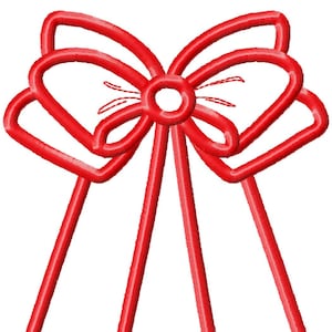 May include: An embroidered bow applique design in red. The bow is made from a single piece of fabric and has a simple, classic shape.