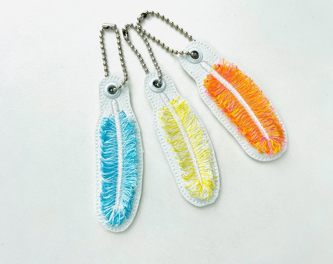 Fringed Fluffy Feather Eyelet and Key Fob Snap Tab simply in the hoop iridescent effect machine embroidery designs ITH keychain bag tag kids