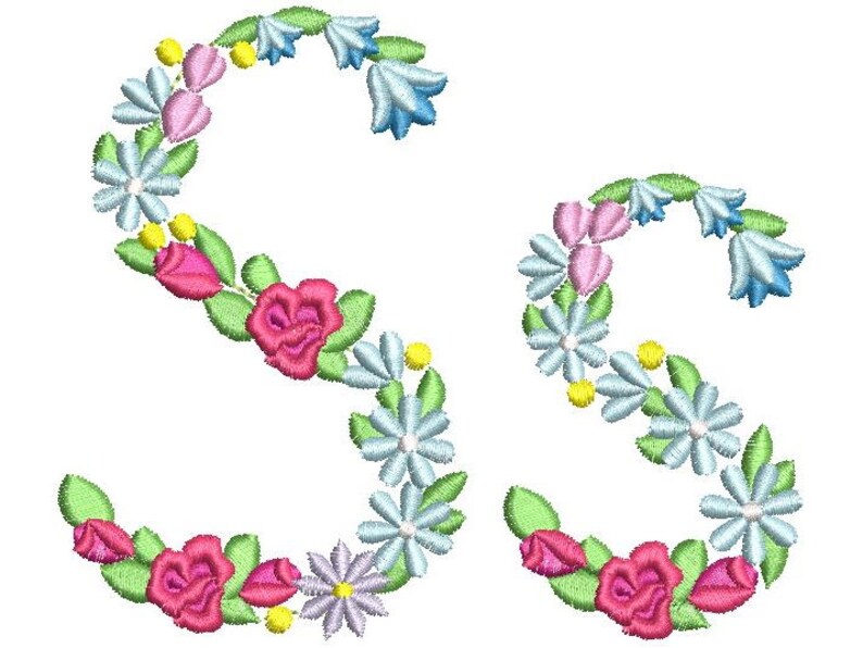 May include: Two embroidered capital letters "S" formed by a wreath of pink, blue and white flowers.