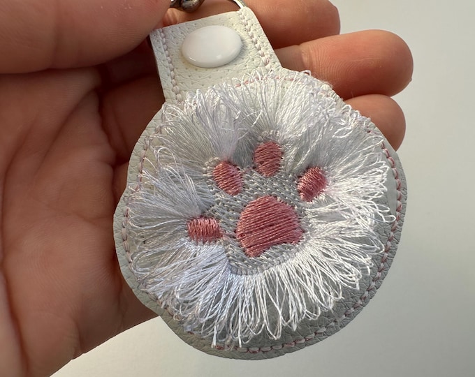 Fringed Cat Kitty Paw Eyelet and Key Fob Snap Tab in the hoop machine embroidery designs ITH project key ring keychain fluffy fur cute Paw