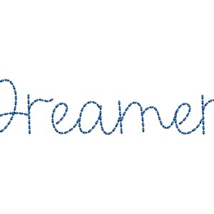 May include: The word "Dreamer" is spelled out in a blue, stitched font.