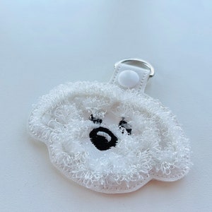 Fringed Maltese dog keychain key fob snap tab in the hoop machine embroidery designs ITH project Awesome fluffy fur puppy kids backpack tag