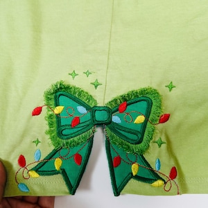Fringed fluffy Bow and Christmas lights side bow split seam in the hoop machine embroidery designs heirloom Bow sweatshirt t-shirt design
